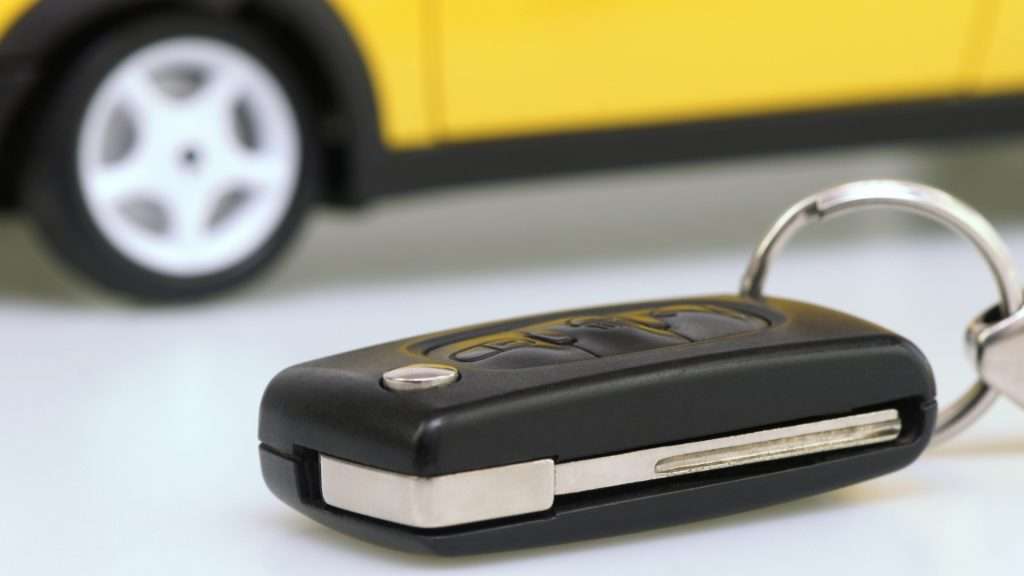 A flip-style car key