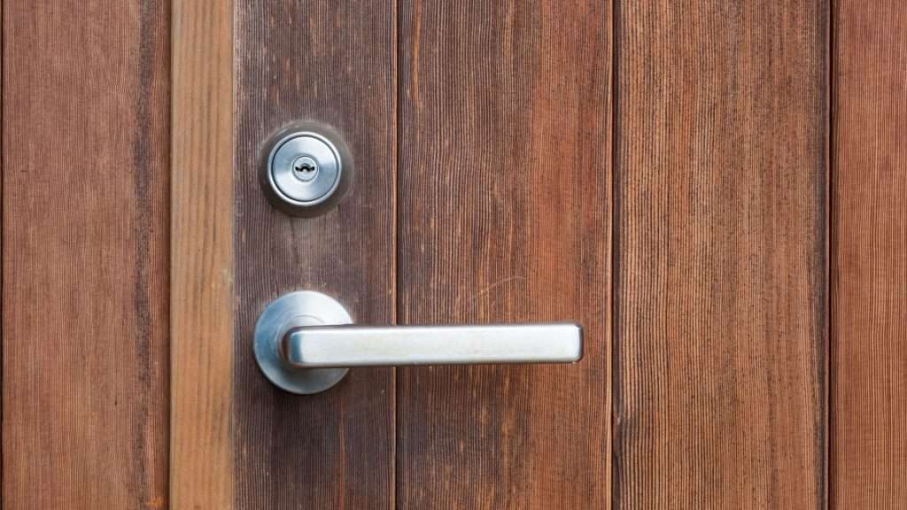 A lever handle lock set on a residential door