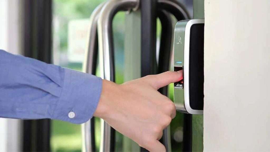 A user scanning their thumbprint on one of their storefront locks