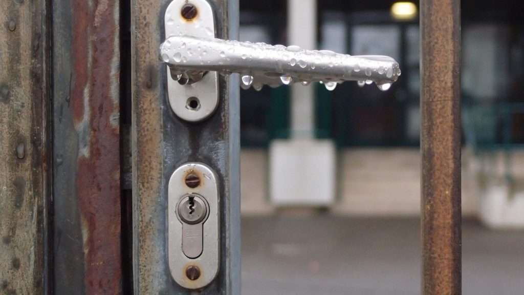 An image of a lever lock on a steel gate