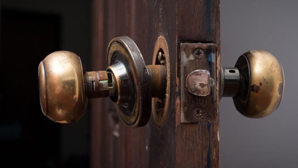 Close-up of old door hardware needing replace door lock service in Pittsburgh PA